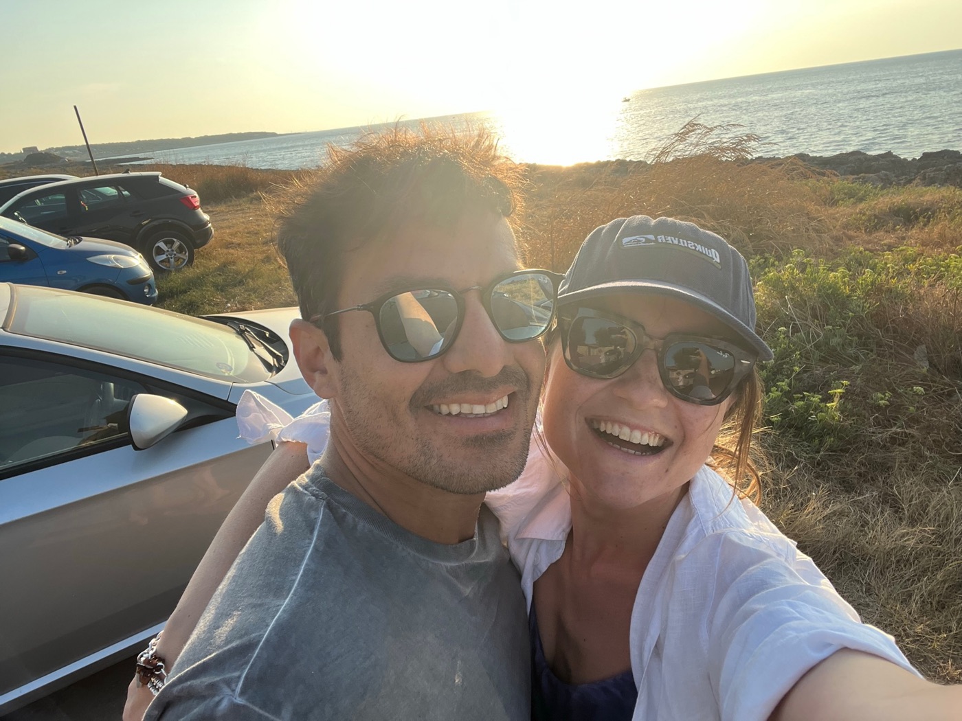 Eli and Rafa at sunset by the sea in Puglia